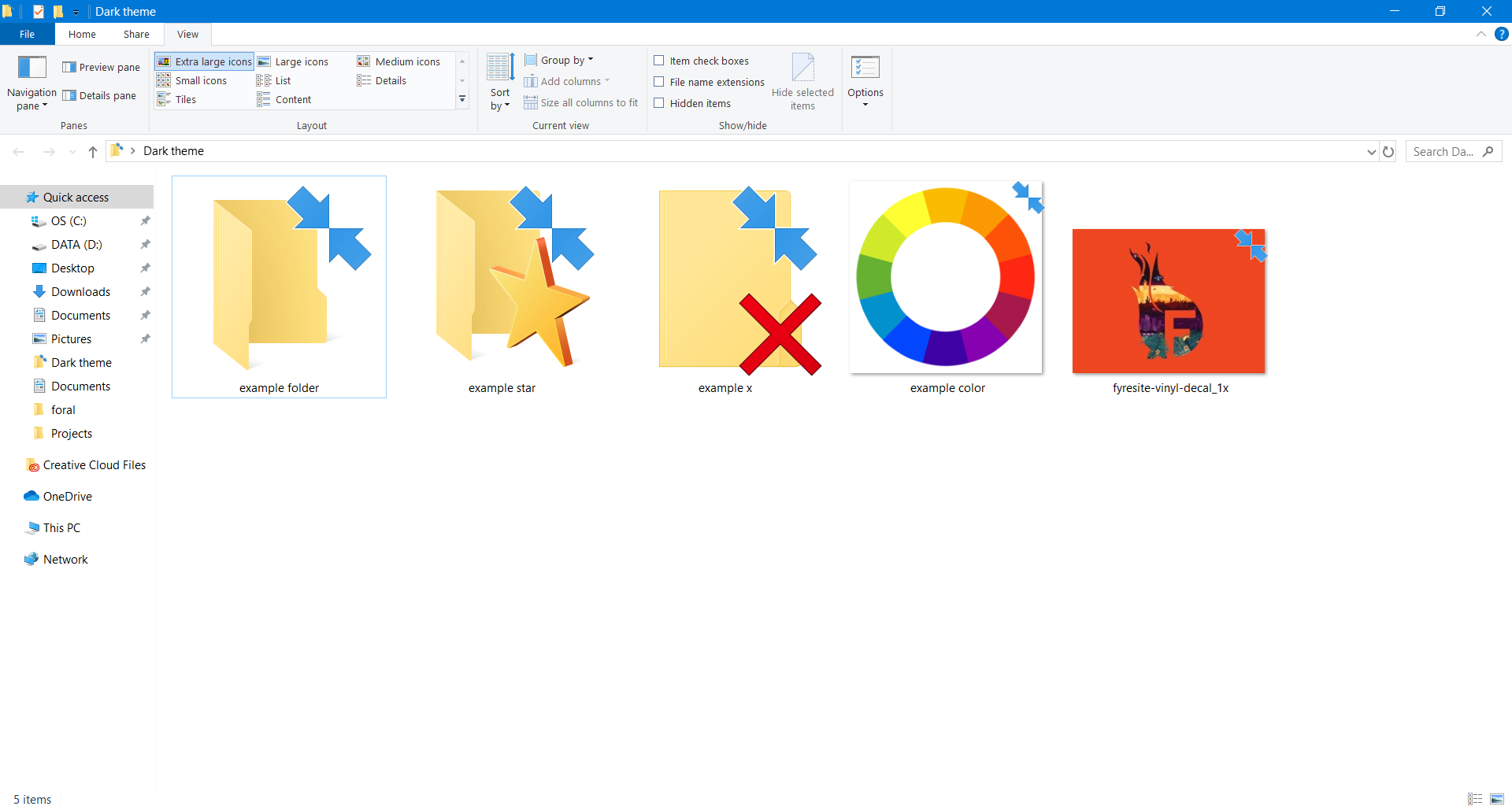 Three different folders and two brightly-colored images in file explorer on standard Windows 10