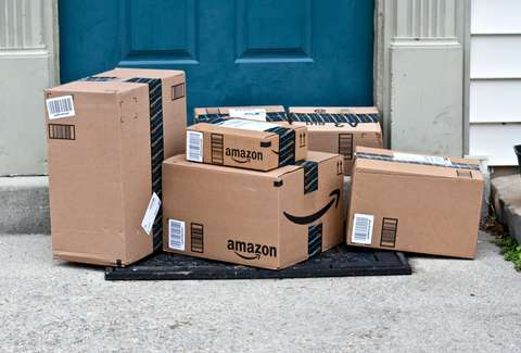 Several amazon packages on a porch